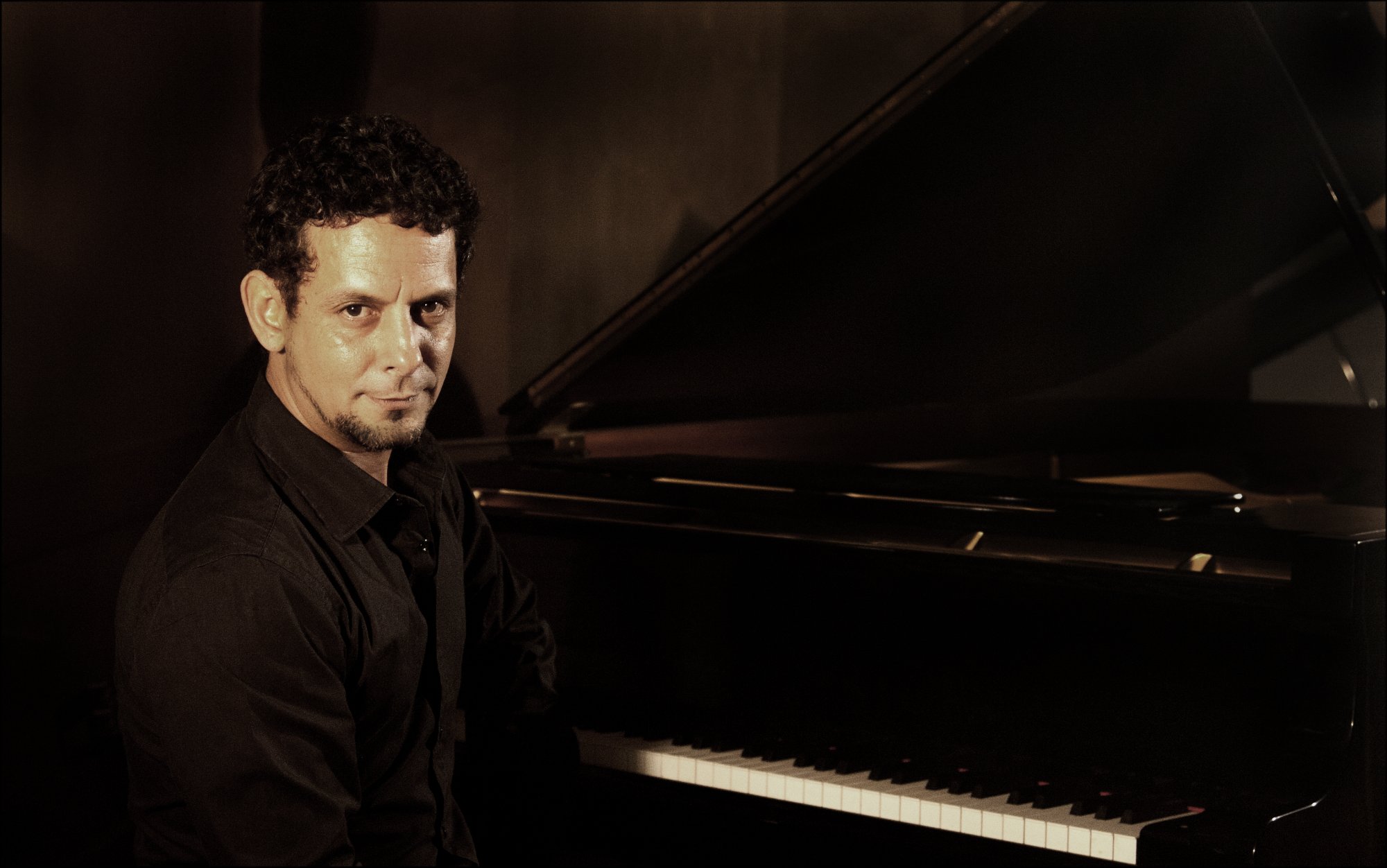 Ernesto Cisneros Cino at the piano